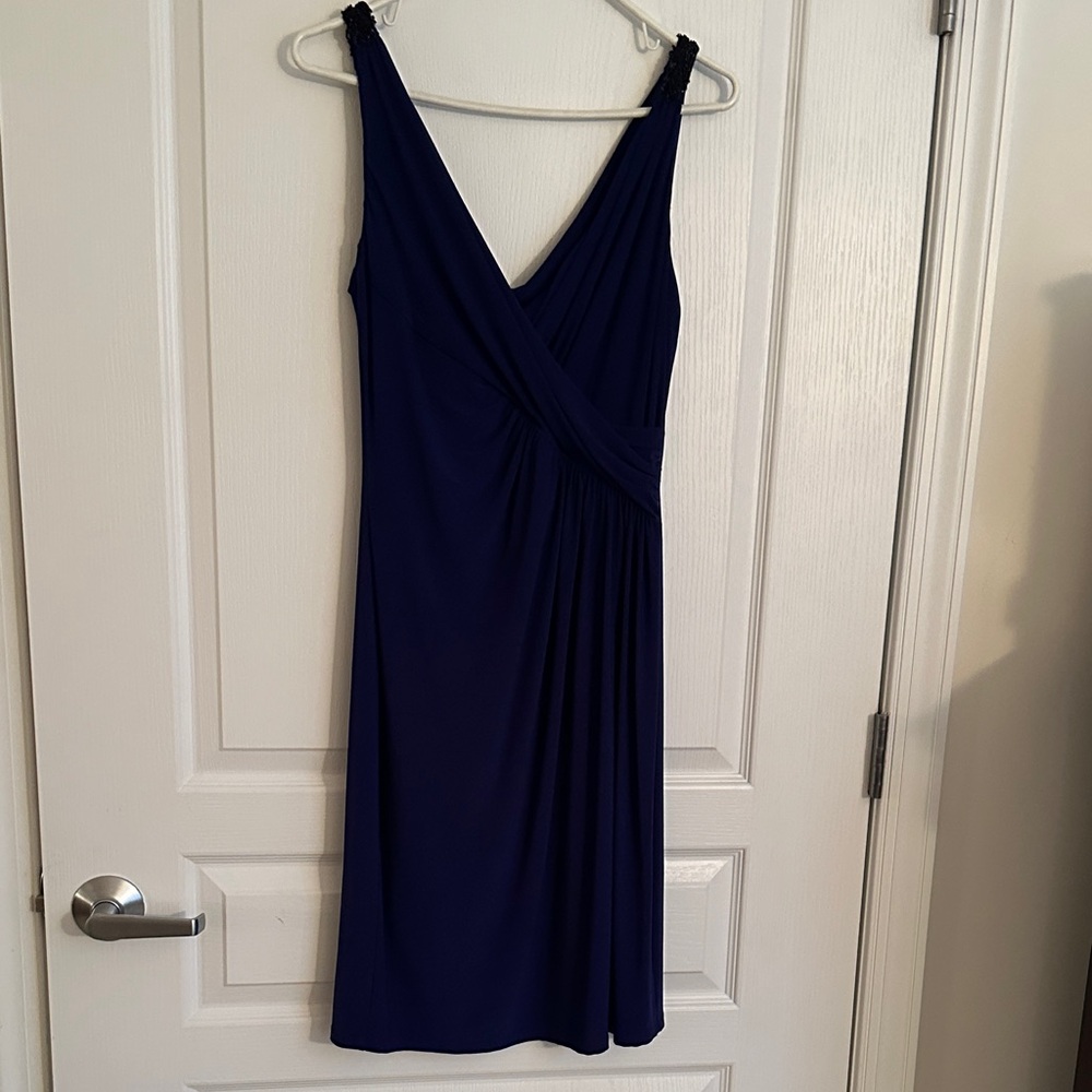 Stylish Navy Midi Cocktail Dress with Embellishment on the Straps.